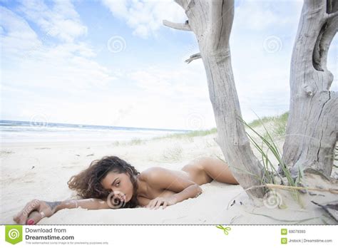 Gorgeous Brunette Lying In Sand Stock Image Image Of Happy Lying