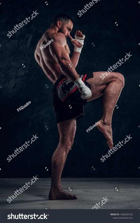 Muscular Handsome Fighter Naked Torso Demonstraiting Stock Photo