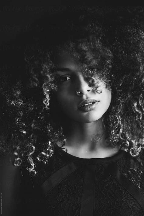 "Portrait Of A Beautiful Mixed Race Woman" by Stocksy Contributor