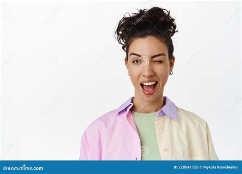 Sassy Brunette Asian Girl Shows Heavy Metal Rock On Gesture Sticking