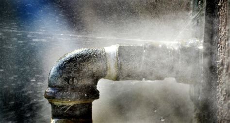 Broken Pipe With Leak Spraying Water Drops Into The Air Major Problem
