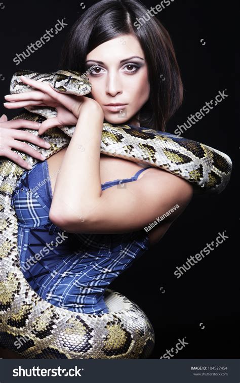 Sexy Brunette Holding Python Over Black Stock Photo Shutterstock