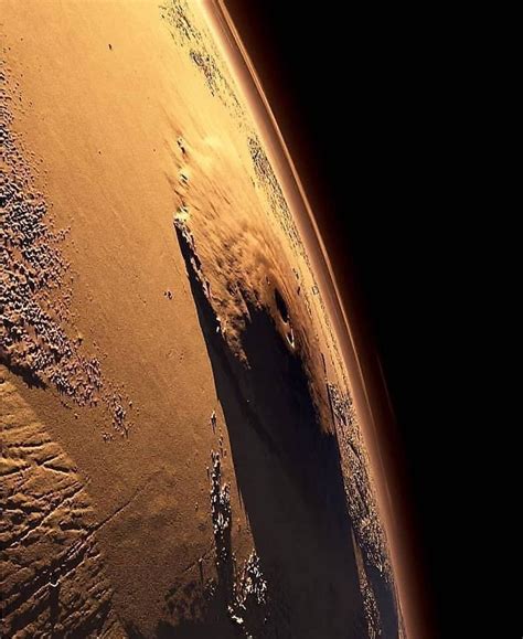 Olympus Mons On Mars Has A Height Of 21 Km And Is About Two And A Half