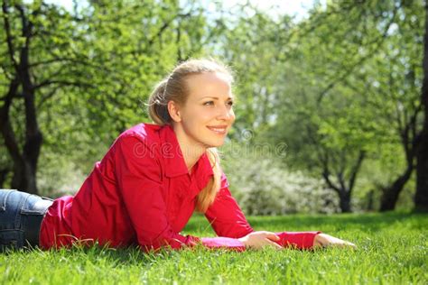 Beautiful Blonde Lies On Grass In Garden Stock Image Image Of Happy Female 10353615