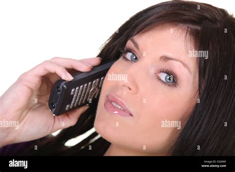 Brunette Making Telephone Call Stock Photo Alamy