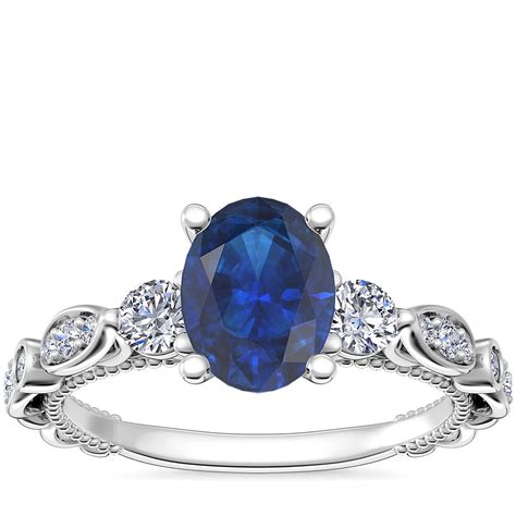 Floral Ellipse Diamond Cathedral Engagement Ring With Oval Sapphire In