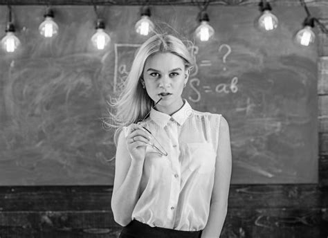 Teacher With Waving Long Blonde Hair Looks Sexy Lady Strict Teacher On Dreamy Face Stands In