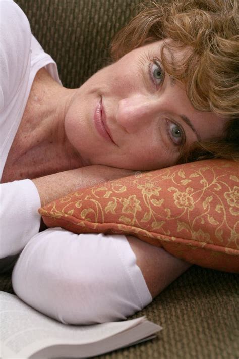 Attractive Brunette Woman Relaxing On Couch With Book Stock Image Image Of Lifestyle Brunette