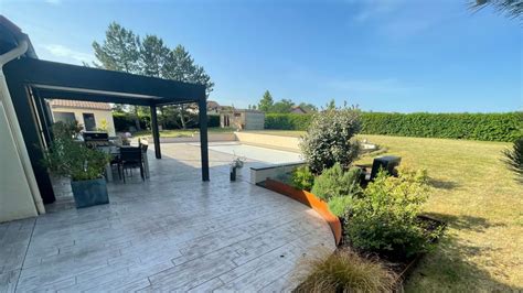 Terrasse et plage de piscine en béton imprimé à Serbannes 03