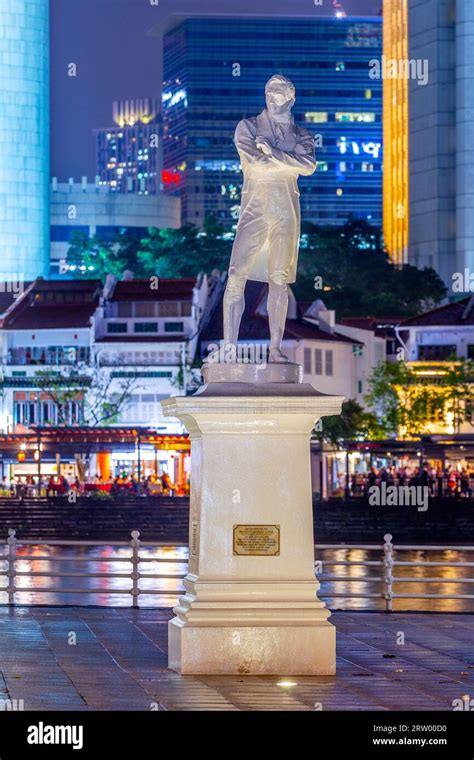 A night view of the statue of Sir Stamford Raffles on the North Bank of ...
