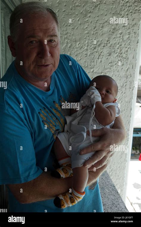 Father Holds His Baby Stock Photo Alamy