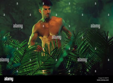Handsome Nude Guy In The Hot Jungle Stock Photo Alamy