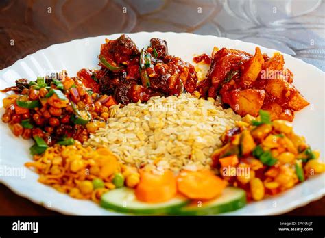 Nepali Food And Snacks Dal Bhaat Sekuwa Khaja Set Mo Mo Dumpling