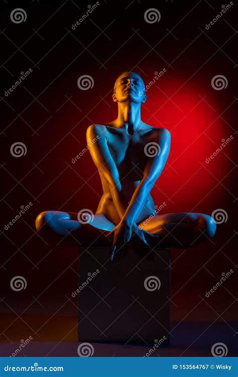 Naked Girl Sitting On The Cube In Color Lights Stock Image Image Of Relax Fine
