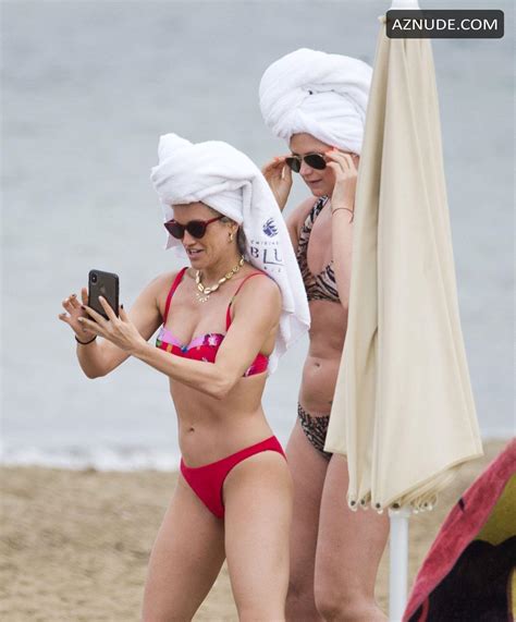 Ashley Roberts Sexy In An Incredible Svelte Physique In Her Striking Red Floral Patterned Bikini