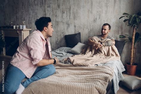 Happy Gay Couple Having Fun In An Intimate Atmosphere Positive Blue Man Laughing At His Mate S