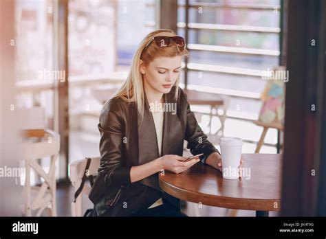 Beautiful Blonde In Cafe Stock Photo Alamy