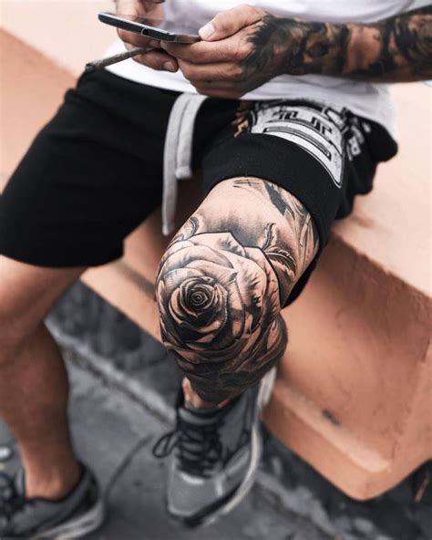 Male Above The Knee Tattoo