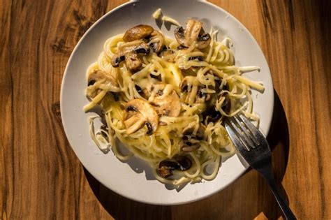 Premium Photo Homemade Italian Fettuccine Pasta With Mushrooms And