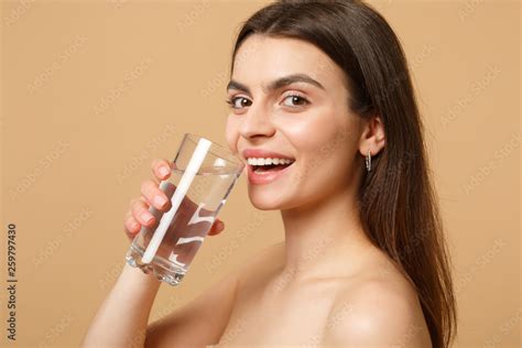 Close Up Brunette Half Naked Woman 20s With Perfect Skin Nude Make Up Glass Water Isolated On