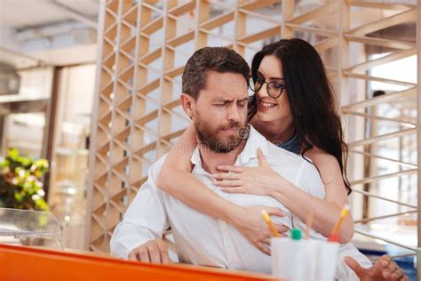 Seducing Colleagues In Office Blonde Woman Flirting With Handsome Smiling Business Man Pulling