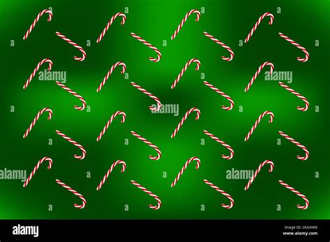 Christmas Pattern On A Dark Green Background With Two Christmas Candies