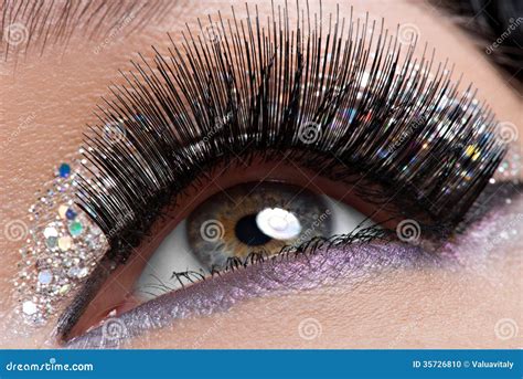 Eye With Long Black False Eyelashes And Creative Fashion Makeup Stock