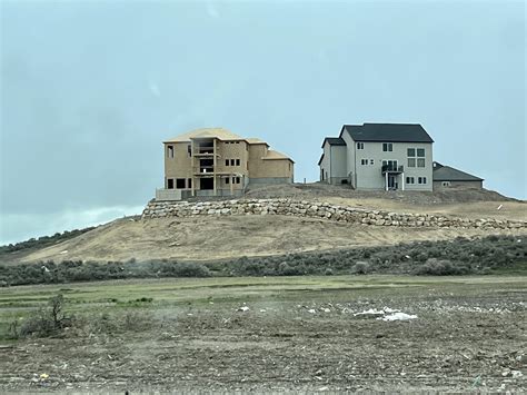 Just Put More Sand Piles Around The Houses Built On Sand Edge Homes