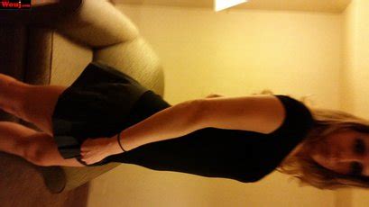 Hot Blonde Amateur In Black Dress Poses Seductively For The Camera Photos