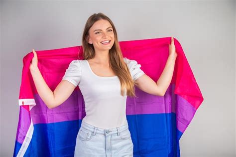 Premium Photo Blonde Brazilian Woman With Lgbt Bisexual Flag