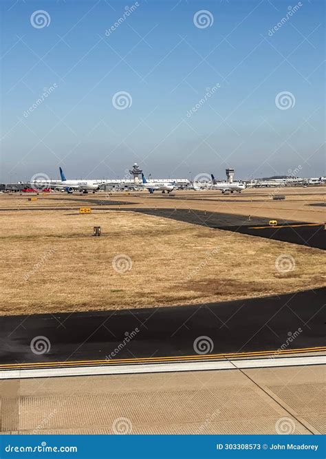 Three United Airlines Jets Parked at on the Runway at IAD Editorial