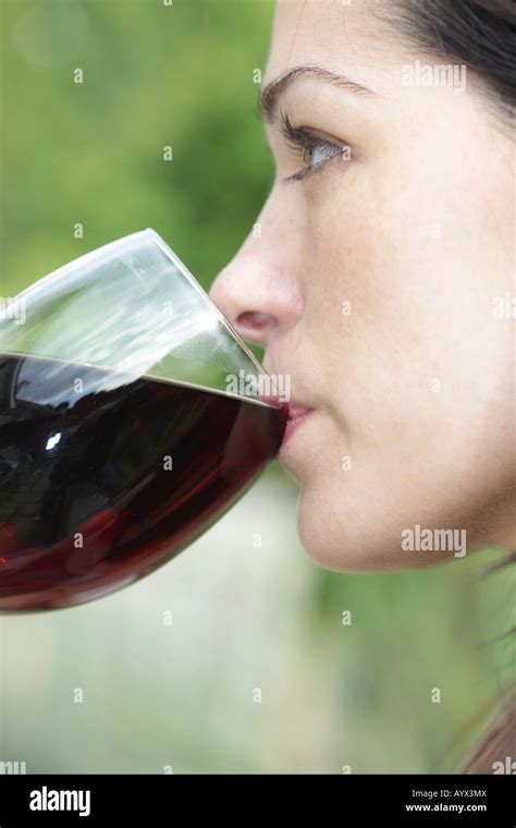 Young Woman Drinking Red Wine Model Released Stock Photo Alamy