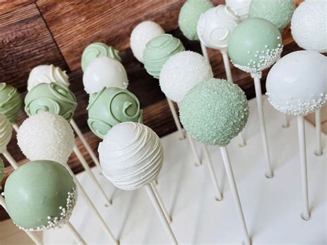 There Are Many Green And White Cake Pops