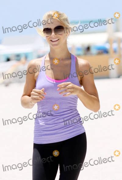 Photos And Pictures Blonde Cutie Julianne Hough Jogs Along Miami Beach In A Purple Tank Top