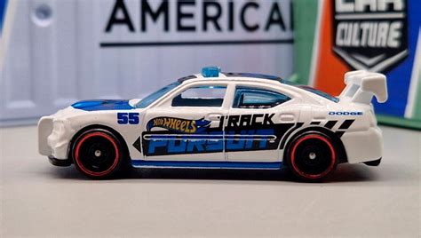 Машинка Базова Hot Wheels Dodge Charger Drift Metro HKJ White купити в інтернет