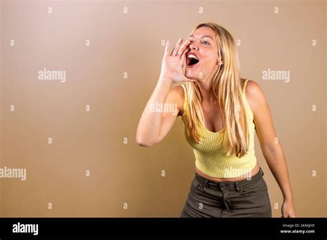 Hispanic Blonde Girl Screaming Concept Raising Her Voice Stock Photo