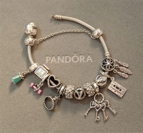 pin de sunnyy em obsessed pulseira de berloques vivara acessorios