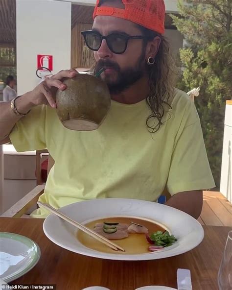 Heidi Klum Puts On A Busty Display In A Tiny White Bikini While Enjoying An Ice Cream Cone