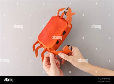 A Fun Craft Project Crab Creation Is Made From An Orange Painted Egg