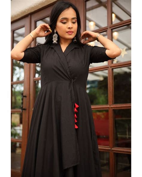 black wrap dress  tassels  ambraee  secret label