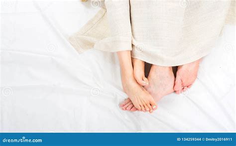Close Up Of Feet Couple Having Sex On A Bed At Home In The Night Feet Of Couple In Comfortable