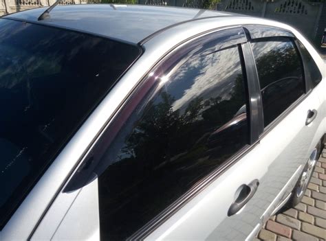 установка ветровиков на двери и фаркоп — Ford Focus I Sedan, 2 л, 2003 ...