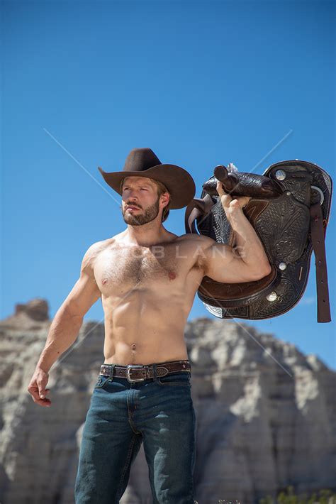 Hot Muscular Shirtless Cowboy With A Saddle Outdoors Rob Lang Images