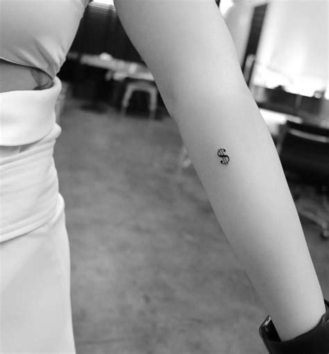 Dollar Sign Tattoo On Becky G S Left Inner Forearm