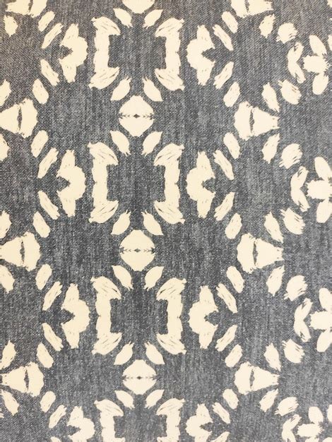 Premium Photo A Grey And White Rug With A Floral Design On The Front