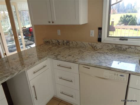 Aspen White Granite With White Cabinets — Madison Art Center Design