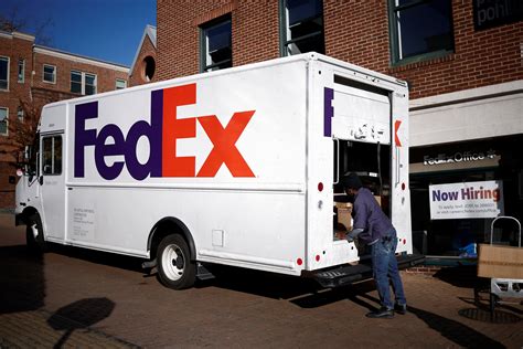 Shoppers rush to the closest fedex station for holiday shipping 9