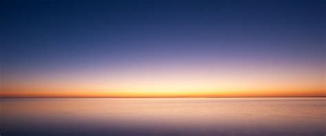 2560x1080 Sunrise Ocean Minimalism Simple Background Wallpaper2560x1080 Resolution Hd 4k