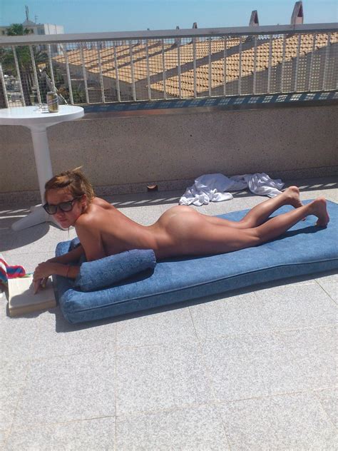 Enjoying A Good Book While Sunbathing Porn Pic