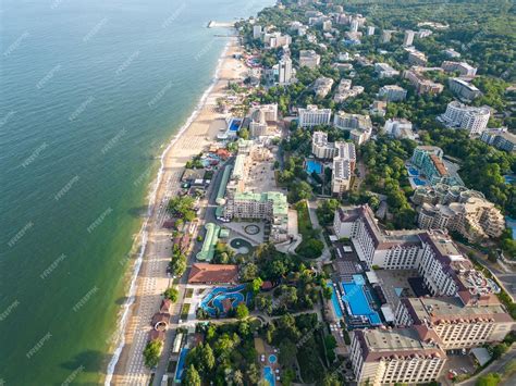 Premium Photo | Aerial view of the beach and hotels in golden sands